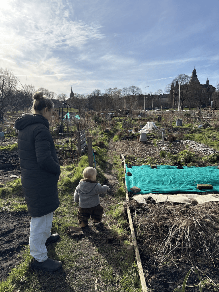 A child and parent at Leith Community Croft an Urban Farm based in Edinburgh. 